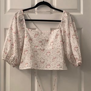 White / floral blouse with backless lace up detail
